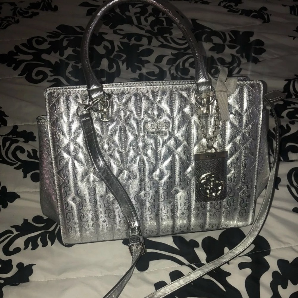 Guess silver purse with tags brand new